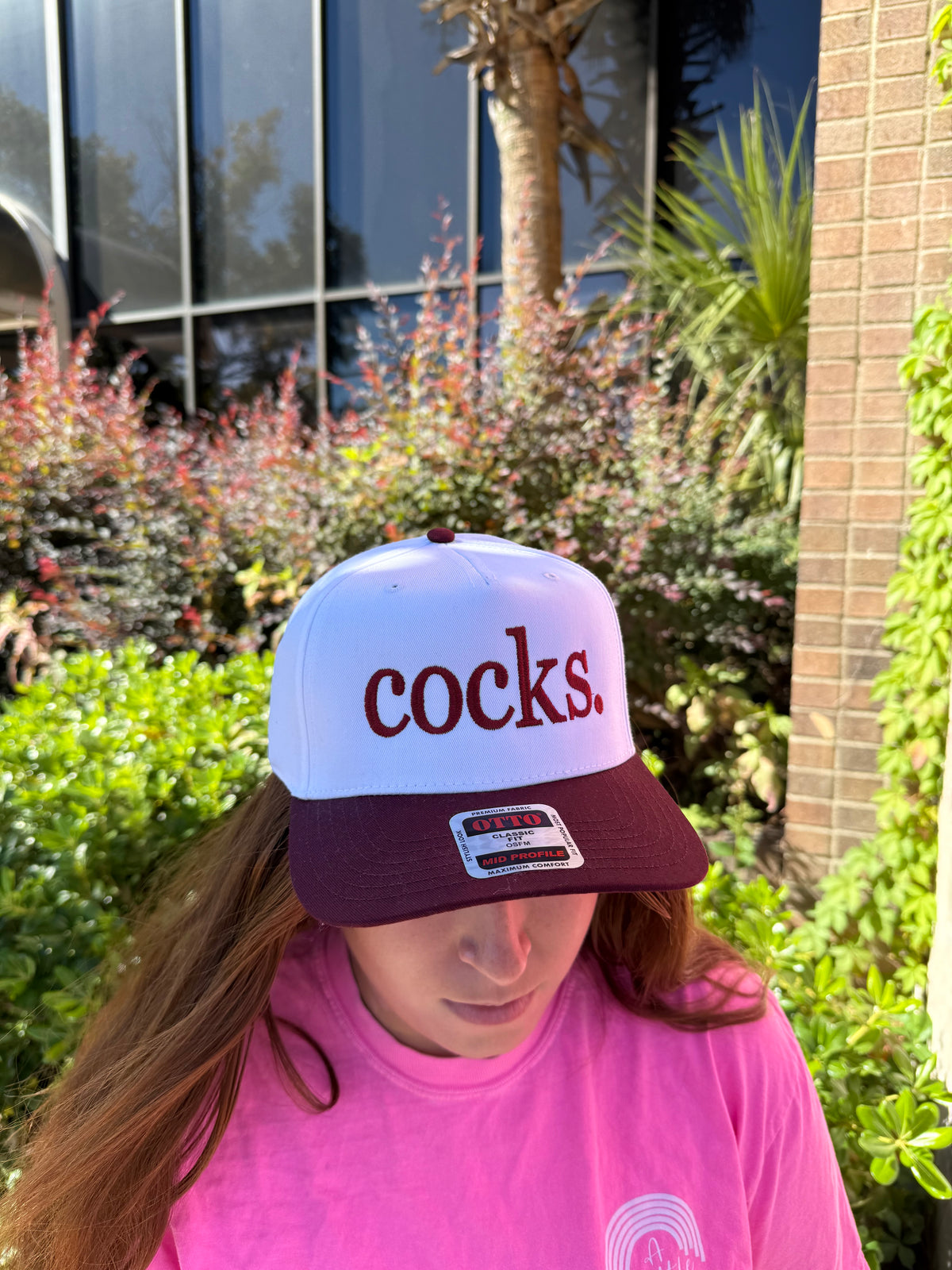 cocks. hat
