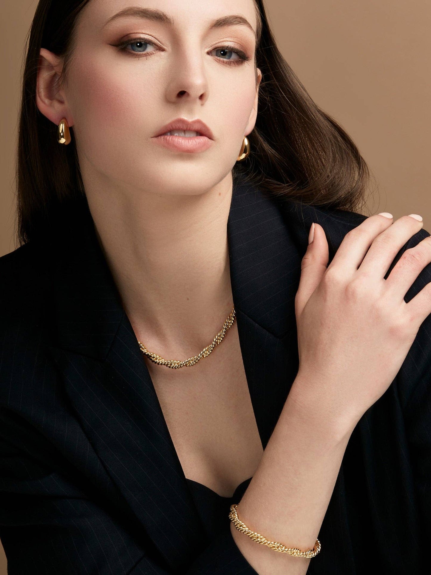 Braided Twisting Links Bracelet: Gold